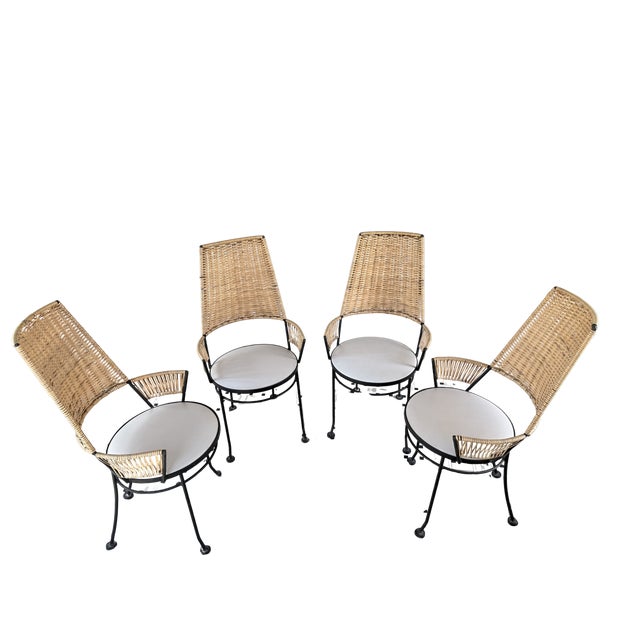 Iconic mid century modern dining set designed by Arthur Umanoff for Shaver Howard, featuring a sculptural wrought iron...