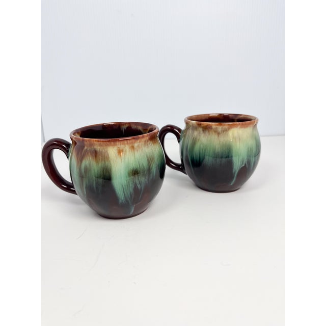 Beautiful 80s vintage mug set with drip glaze in earth tone shades and turquoise. In great condition. No chips, cracks or...