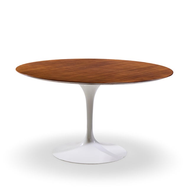 Eero Saarinen for Knoll Mid Century 54 Inch Walnut Tulip Dining Table This dining table measures: 54 wide x 54 deep x...