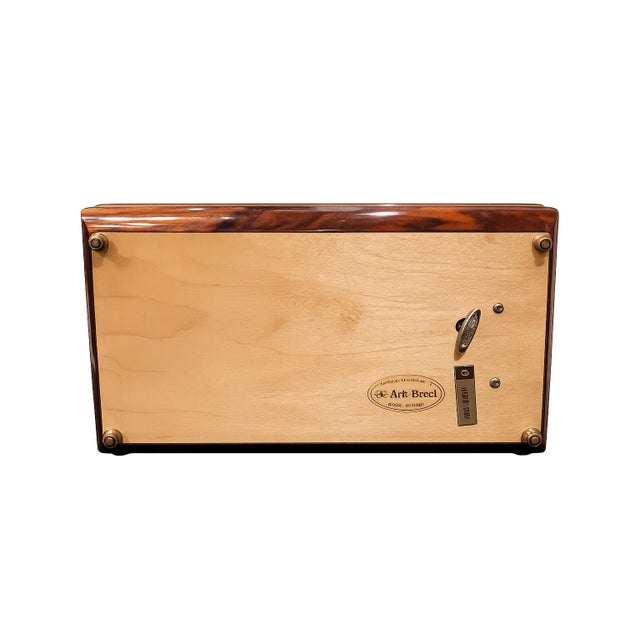 This charming mid-century Italian music jewelry box dates to the circa 1960s and features a beautifully grained inlaid...