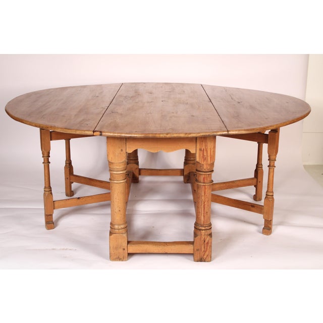 William & Mary style pine gateleg dining room table, mid 20th century. Very versatile table that could be used either as a...