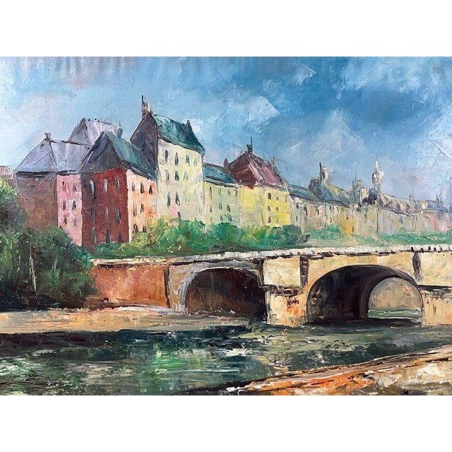 A commanding mid-century Paris cityscape, signed “V. DYK” at lower left and painted in oil on canvas at an unusually...