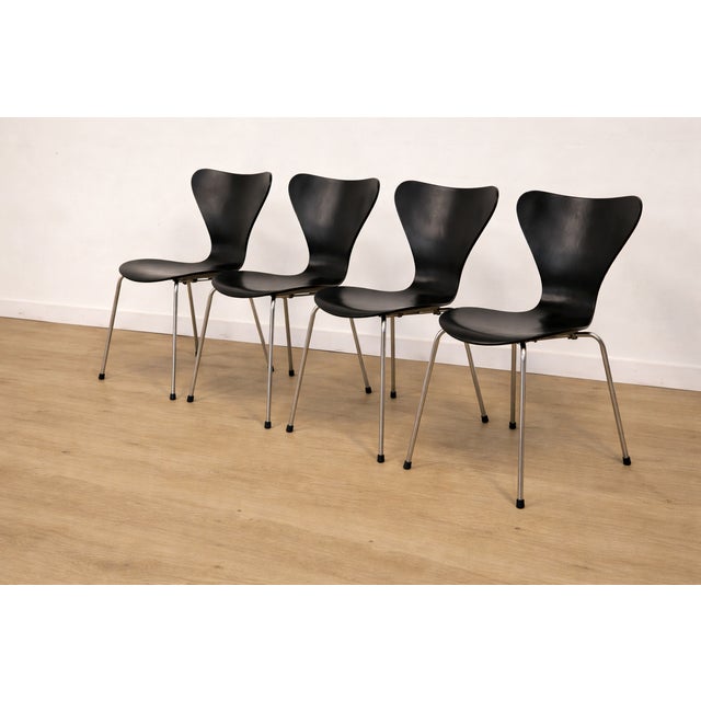 A rare and beautiful set of four Series 7 chairs, an iconic model designed by Arne Jacobsen. An original Fritz Hansen...