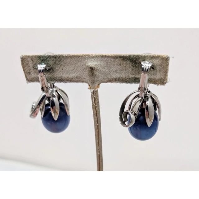 Mid-Century Modern Vintage Signed Napier Cumquat Rhodium Plated Blue Moonglow Resin Drop Clip Earrings-2 Pieces For Sale - Image 3 of 9