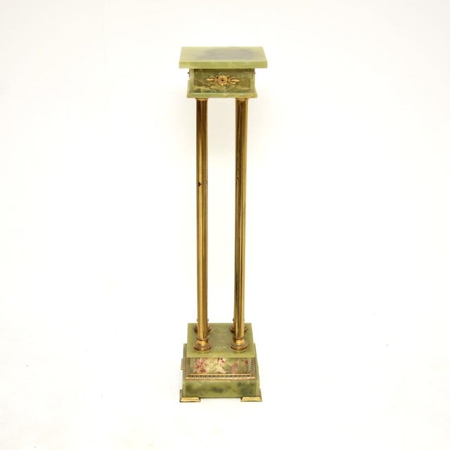 A beautiful antique French onyx and brass plant stand column, dating from around the 1900-1920 period. It is of very fine...