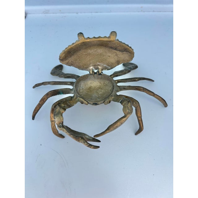 Vintage brass crab ashtray. Features a hinged top shell Mid 20th century ,modern or coastal nautical decor. Has some...