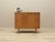 The cabinet was made in the 1960s in Denmark. The structure is covered with ash veneer. The legs are made of solid wood....