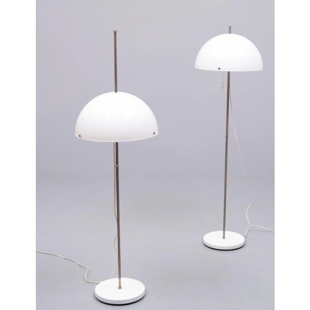 Very nice pair of Floor lamps .White acrylic glass Shades.,that can be changed in height .Two large bulbs each . Pull down...