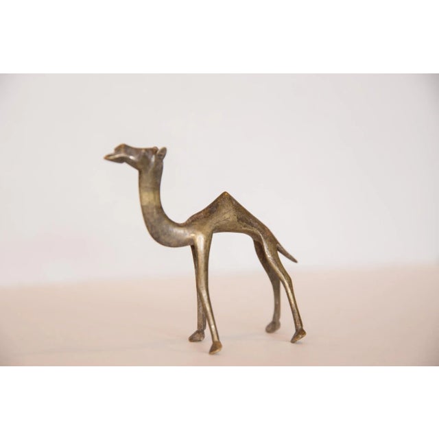 :: Vintage handmade bronze sculpture of a camel. Circa mid 20th century and possibly older, this piece has such incredible...