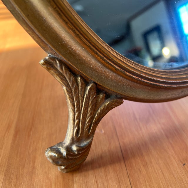 Beautiful 1920’s art deco, dresser, or vanity mirror Gilded gold footed in great condition Measure 17 1/2 inches tall by...