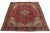 A beautiful Vintage Heriz Handmade Wool Rug with a red field and multicolor accents in medallion design. This rug...