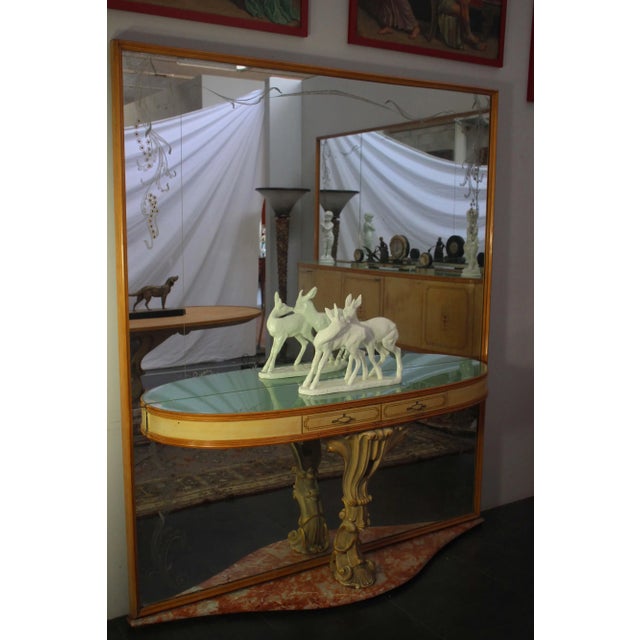 - 1940s console table - Art Deco style - Base in red marble from France - Central pilaster in carved and lacquered wood -...