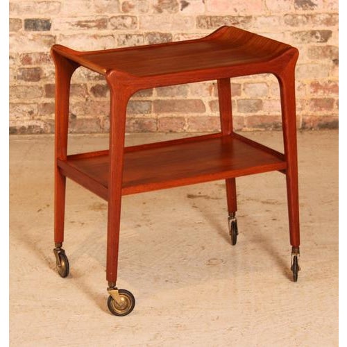 British Mid Century 'Glider' teak serving trolley with removable tray by Paragon, circa 1960s. Excellent condition. W 59cm...