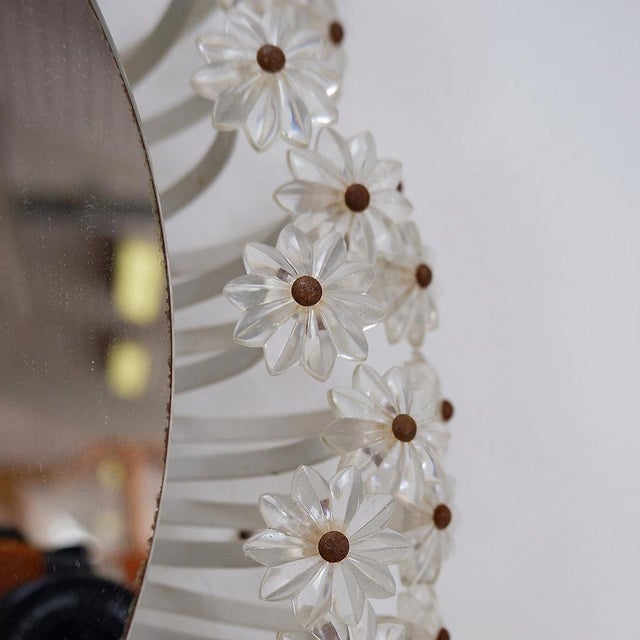 Flower - Mirror - Austria 1960s Measures : Total:Ø 57cm Mirror:Ø:42cm Materials: Metal - Acrylic glass - Mirror This piece...