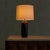 A ceramic table lamp from Torino, Italy, dating to the 1990s. The cylindrical body is hand-glazed in a palette of deep...