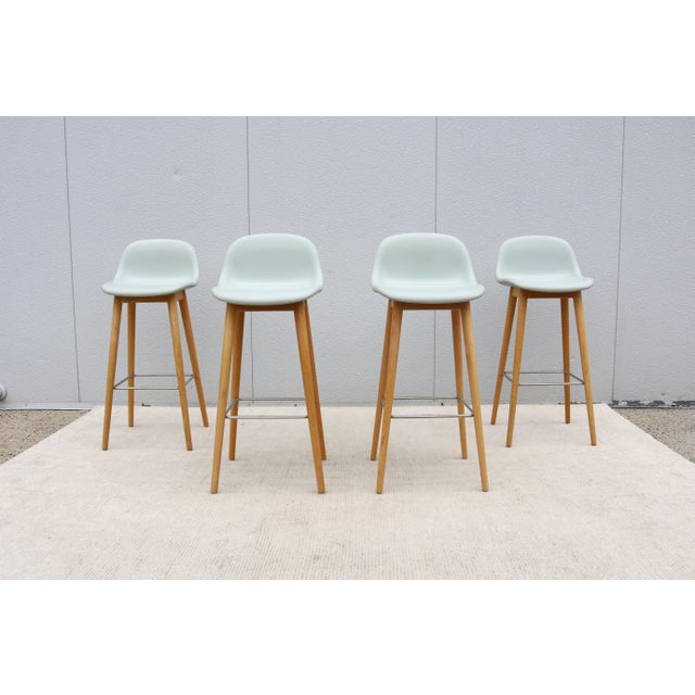 Fabulous set of 4 Fiber bar stools by Copenhagen-based design duo Iskos-Berlin for the Danish brand Muuto. These elegant...