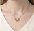 Celebrate timeless elegance with this beautifully crafted double pear gemstone necklace, designed to symbolize connection,...