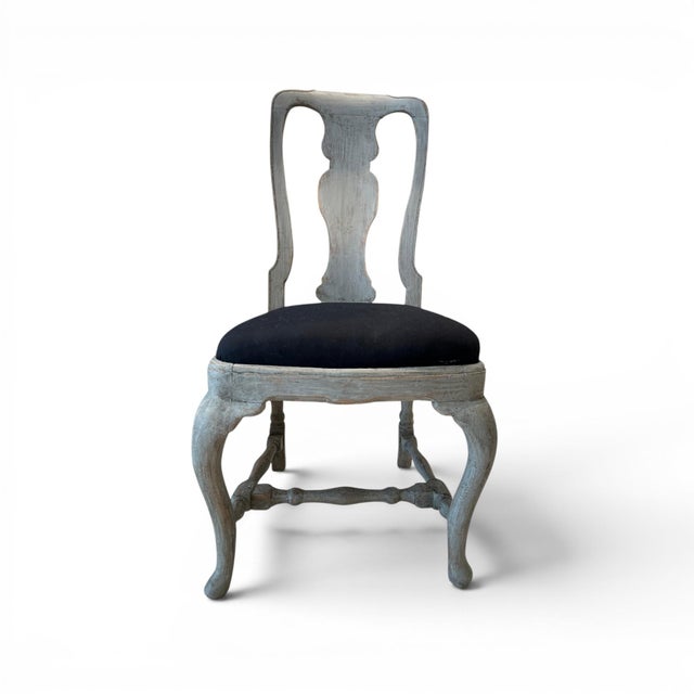 This exceptional set of eight 18th-century Swedish Rococo chairs showcases the graceful curves, elegant carvings, and...