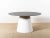 Round dining table with polyethylene pedestal base with laminate top. Matte eggshell and slate finish. Suitable for indoor...