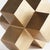 A geometric marvel, this threedimensional plus sign sculpture is a bold accent in a warmGold finish. Place atop a stack of...