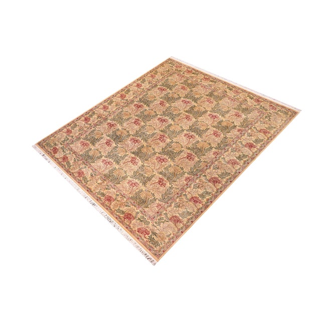 Designed with mesmerizing intricacy and gorgeous color palette, this hand-knotted masterpiece demonstrates the beauty and...