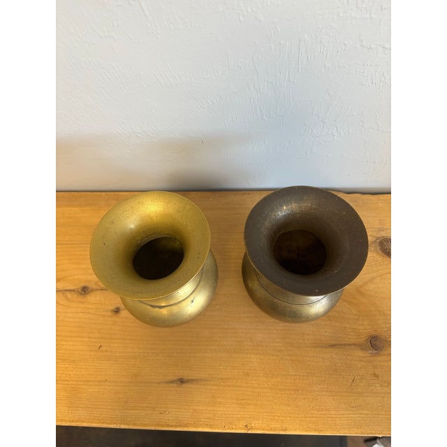 This pair of vintage English brass vessels offers timeless form and beautiful surface character in a wonderfully versatile...
