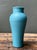 This vintage studio pottery blue ceramic vase is a refined example of mid-century artisan craftsmanship, distinguished by...