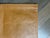 a set of 4 brown leather placemats each made of 6 square pieces with double stitched seams and edges. very fine smooth...