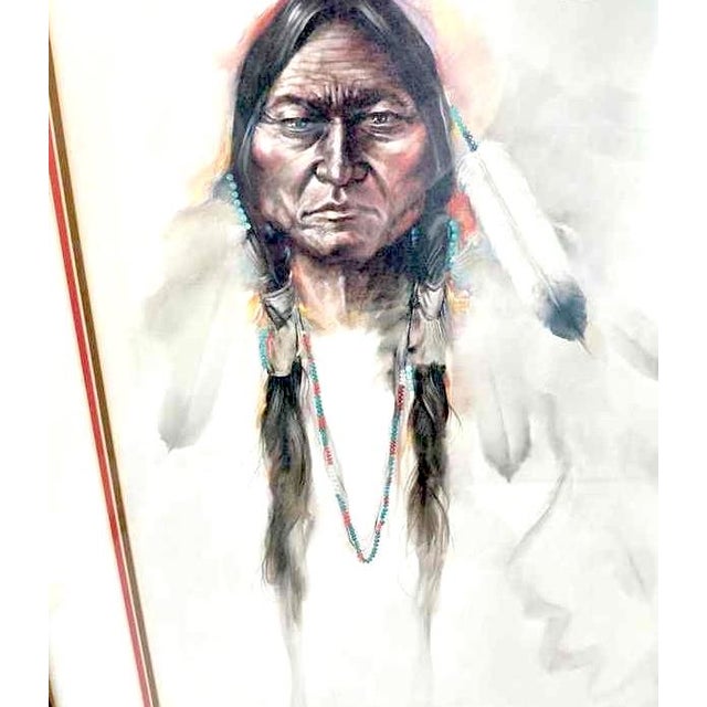 This limited-edition lithograph features a portrait of Sitting Bull, titled by artist Ozz França (1928–1991). This print,...