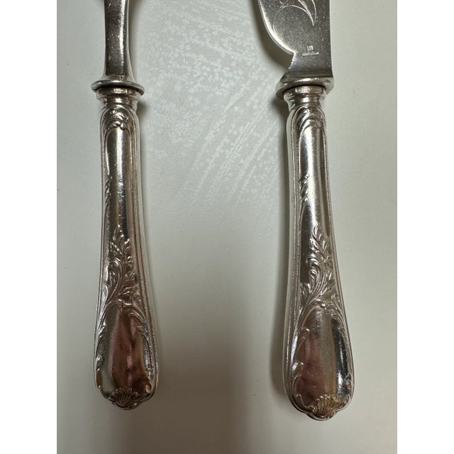 This is an incredible fish set from Christofle . Very early . Notice the fish shaped and chased blade . The newer ones...