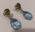 18k/750 white gold earrings with diamonds, topaz, and peridot, in perfect condition. Circa 1990. They weigh 8.5 grams and...