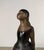 A graceful bronze sculpture of a young ballerina, inspired by the celebrated works of Edgar Degas, whose intimate studies...