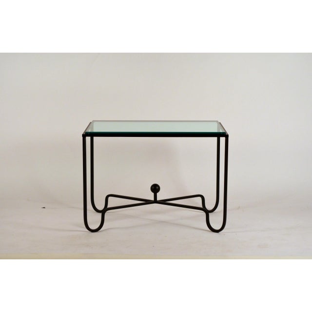 Pair of 'Entretoise' matte black and thick glass end tables by Design Frères. Also great as a two-part coffee table.