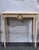 A striking pair of Swedish console tables, circa 1880, with the restrained neoclassical design associated with Gustavian...