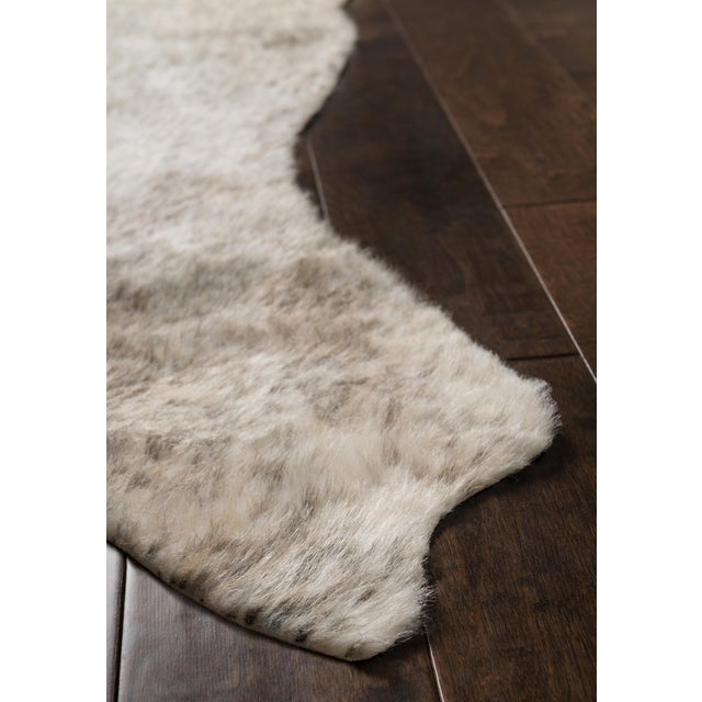 The Grand Canyon is a contemporary rug made in China from woven synthetics. The captivating look and colors are sure to...