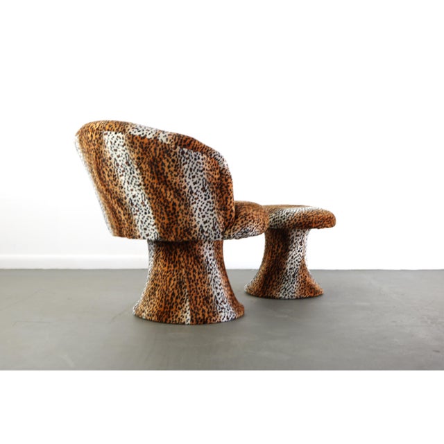 Comfortable and eye catching! This chair and ottoman set are the perfect pop for your space. Small enought to tuck into a...