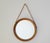 A vintage Scandinavian round mirror with a nice wooden frame. The mid century style mirror is made in Denmark and has a...
