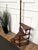 Beautiful Italian carved walnut wood circular step ladder with four stairs rolled around a turned, central pole with a...