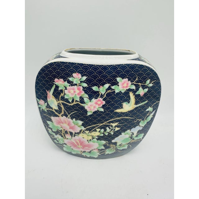 Stunning chinoiserie vase in an unusual shape! Striking navy blue background, lovely intricate painted design