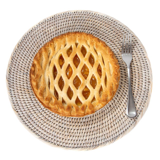 Artifacts Trading Company's hand woven rattan placemats provide the perfect accent to any table setting with a tight...