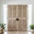 This striking pair of antique double entry doors is expertly hand-carved from solid wood and finished with a richly...