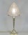 Auguste Mousson A rare 1925-1930 French art deco table lamp in bronze holding a large shade in clear frosted molded-...