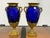 Design Plus Gallery presents a Pair of Gilt Bronze-Mounted Cobalt Blue Vases that are Swedish Neoclassical Style. This...