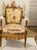 Whimsical Jester Floridus making Christmas cookies armchair designed by Elia.