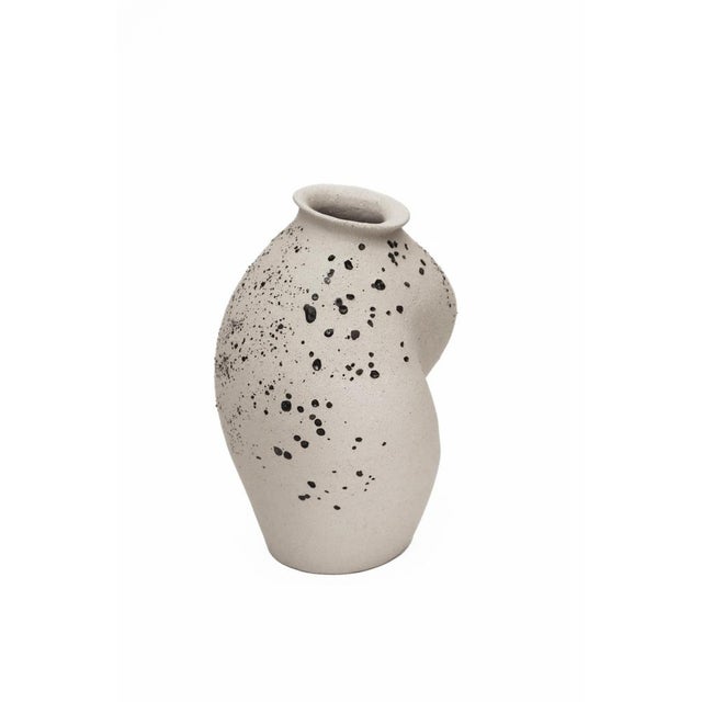 Stomata 4 vase by Anna Karountzou Dimensions: W 12.5 x D 13 x H 23 cm Materials: white stoneware clay, clear glaze inside,...