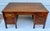 Here is a fantastic desk from the early part of the 20th century that is made of solid wood and was used in the U.S....