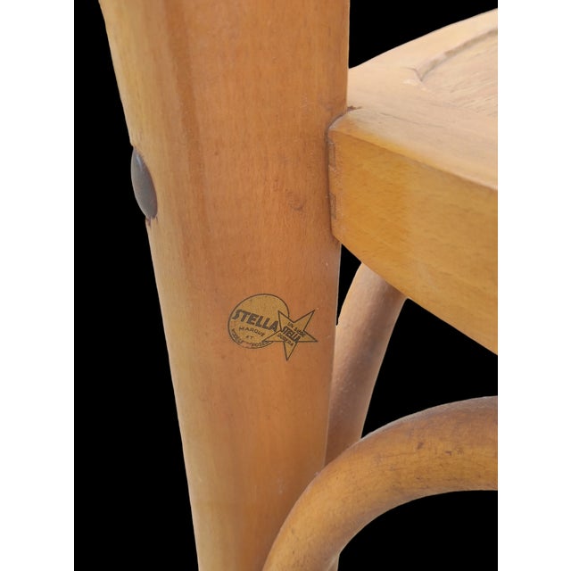 4 varnished beech chairs from the French seat factory Stella This piece has an attribution mark, I am sure that it is...