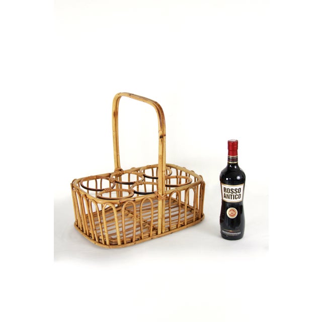 Alfredo is a charming vintage bottle rack made in Italy in the 1970s and hand-crafted entirely from natural bamboo....