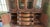Mid 20th Century French Provincial Style China Cabinet — 2-Piece, Brass Lattice Doors, Serpentine Base For Sale - Image 4 of 13