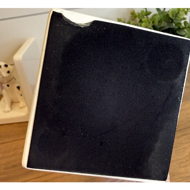 Add a playful touch of Mid-Century charm to your bookshelf or décor collection with this delightful pair of vintage...
